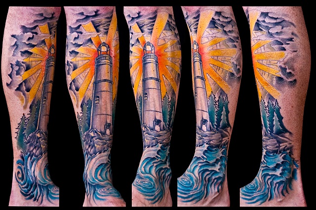 Lighthouse water waves ocean trees color leg sleeve tattoo