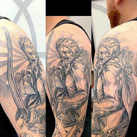 black and grey semi realistic zeus greek mythology tattoo with realistic feels and natural muscle definition