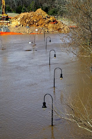 Flooded Street Lamps in Ray Charles Park. "Georgia" was playing from the musical, spinning statue of Ray.
