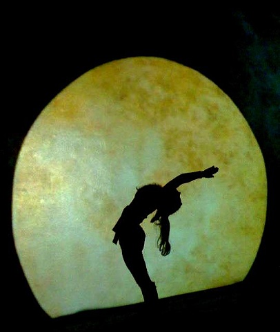 Brandy Skipton-Harrington doing yoga in the moonrise animation in MFA graduate exhibition installation environment "When the Barn Burns Down..." by Eugenia Mitsanas