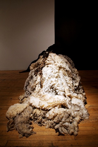 raw wool sculpture in MFA graduate exhibition installation environment "When the Barn Burns Down..." by Eugenia Mitsanas