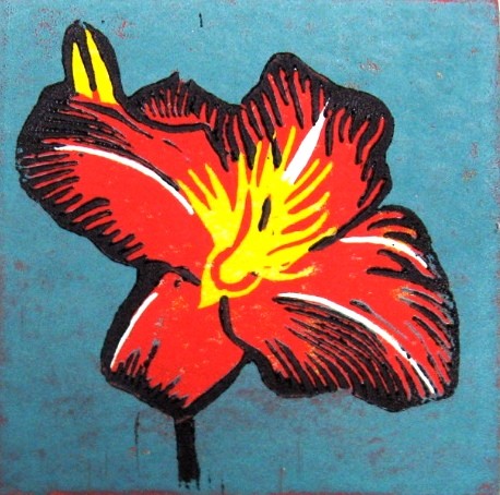 A linocut of a red lily by Leslie Moore of PenPets