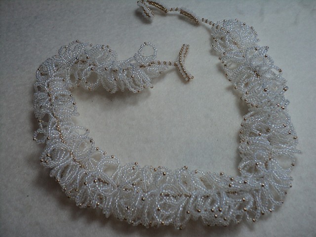 Opaque white multi-loop necklace w/gold accent beads