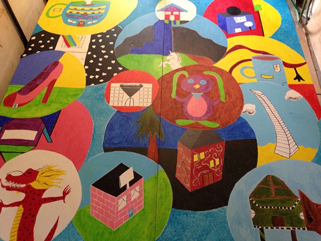 Multicolored mural of children's building designs