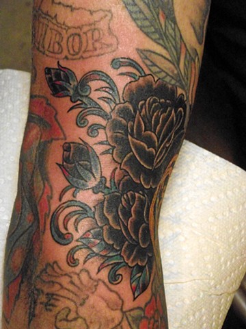Black roses. Traditional flower tattoo. Dirk Spece.Gold Standard Tattoo. Bend Oregon.