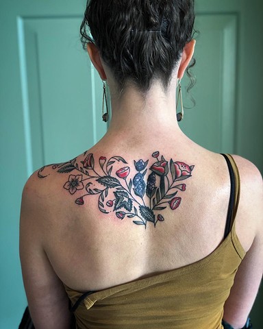 Back color flowers tattoo by Kc Carew in Bend, Oregon