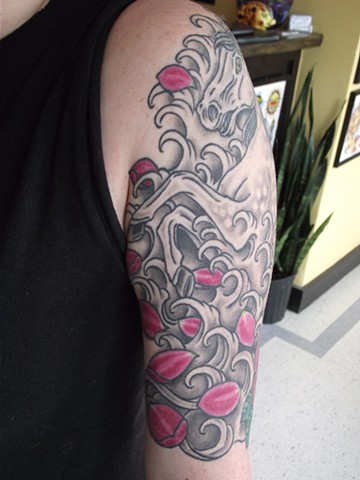 Horse, flower & waves half sleeve (front). Dirk Spece of Gold Standard Tattoo, Bend, Or.