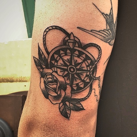 Rose and compass tattoo by Kc Carew at Gold Standard Tattoo in Bend, OR.