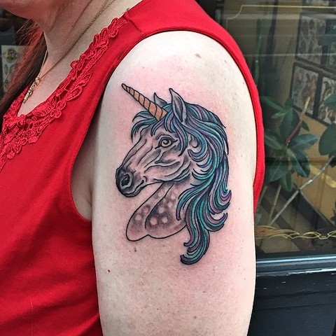 Unicorn tattoo by Dirk Spece at Gold Standard Tattoo in Bend, OR.
