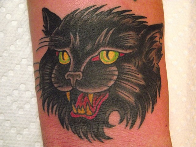 Traditional black cat tattoo. Gold Standard Tattoo Shop. Bend Oregon. Dirk Spece.