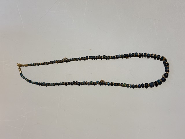 Deep blue Malian Djenne glass beads with bronze accent charms (1500 AD) (25004)