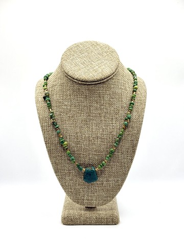 Teal Djenne beads, glass (1200 AD, Mali), Ancient handmade bronze (India) / Green nephrite (1200 AD)