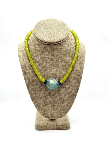 Recycled Javanese glass, Ashanti glass, olive jade / Roman glass, bottom of perfume bottle  (+/- 200 AD)