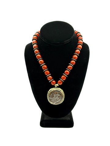 Yak bone, red resin beads / Ancient Rome whale creature in bronze