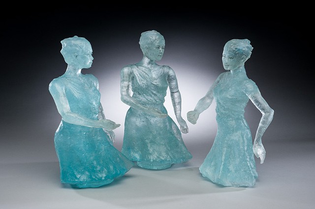 female figures caught in motion, cast in glass using lost wax casting