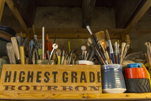 Work tools sitting on the shelves. By Carol Naughton Ceramics Studio