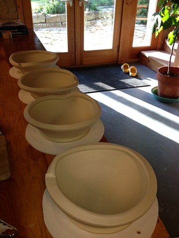 Porcelain bowls drying, waiting to be trimmed. By Carol Naughton Ceramics