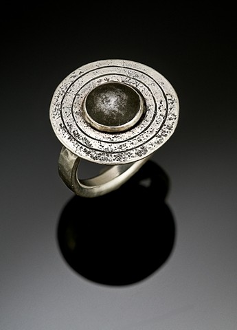 Ring with found piece