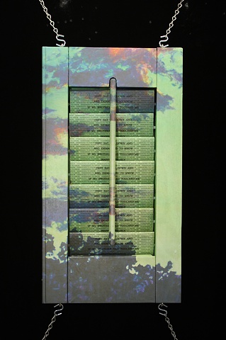 Mixed media--digital landscape image on interior wooden window shutter; one-way mirror and text behind slats.