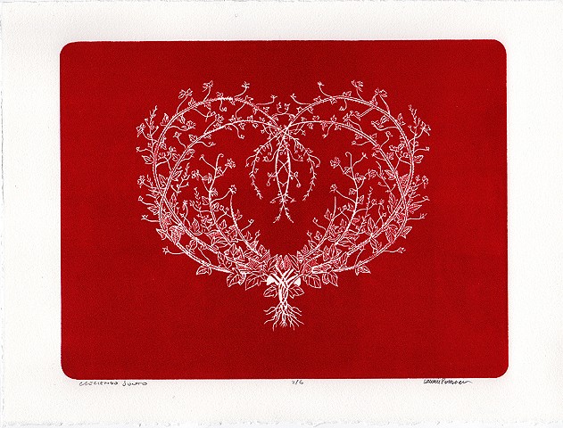 a heart made of branches on a red background