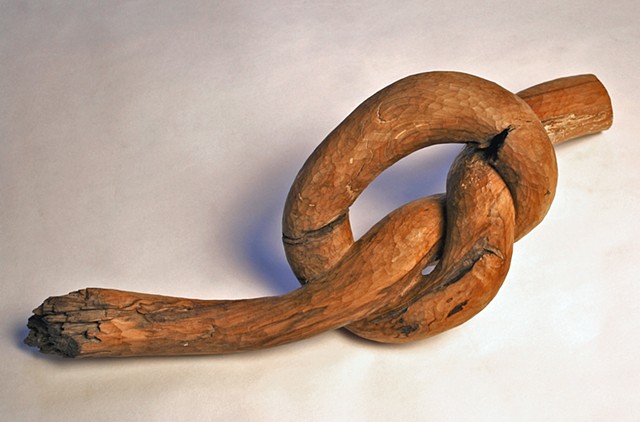 Carved applewood knot form by Lin Lisberger