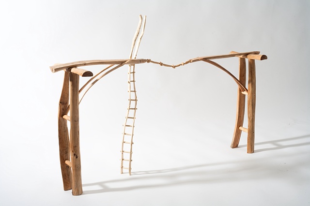 Wood sculpture of bridge, carved knots and ladder by Lin Lisberger