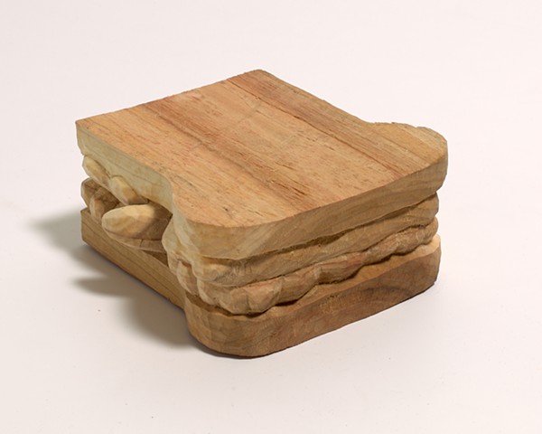 Carved wood sandwich sculpture by Lin Lisberger
