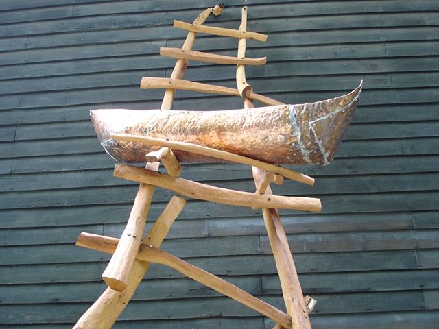 Wood sculpture of ladder and boat installed at Chesterwood by Lin Lisberger