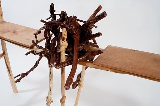 Wood sculpture of bridge and carved knots by Lin Lisberger