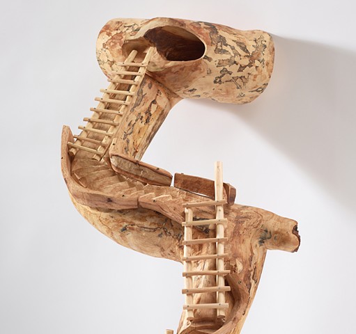 Wood sculpture by Lin Lisberger about the ladders at Bandelier National Monument