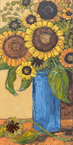 Sunflowers in a blue vase painting