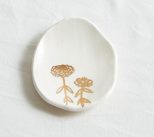 White and gold dish