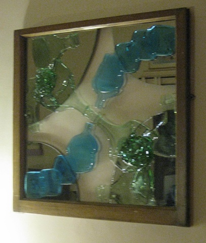 mirrors, bottle glass in old sash