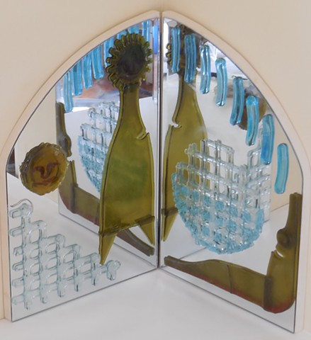 Mirrors at a right angle.   Slumped bottle parts, swarf and window glass.   For a corner or pedestal.  I GO POGO