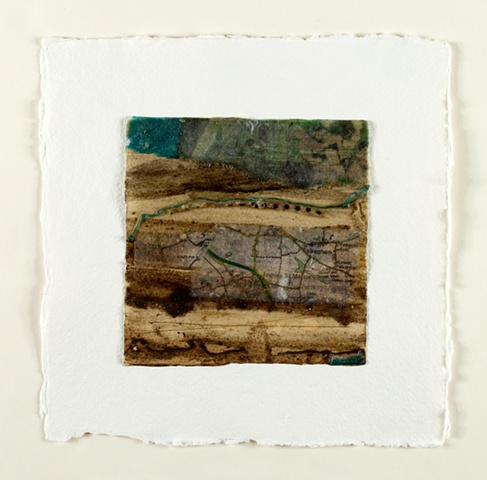 mixed media, found objects, map, thread, mud