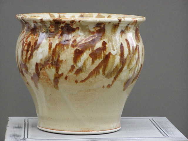 Hand thrown stoneware vase, fired at Cone 6 in earth tone glazes by ngheslep.