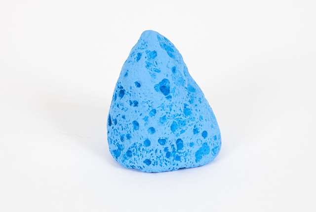 small blue sculpture of conical sponge material
