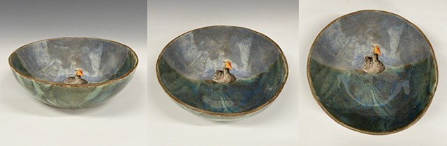 Ceramic bowl with handpainted Toulouse goose floating on water by Chantelle Norton
