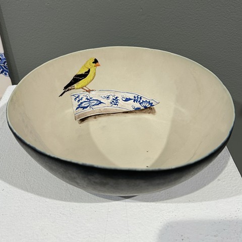 Painted Goldfinch bird with Blue Danube pottery shard on cobalt blue porcelain bowl.