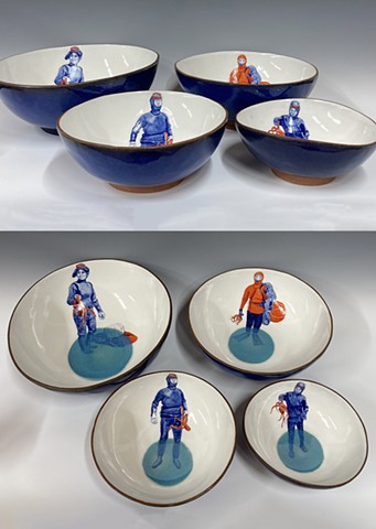 blue ceramic bowls with painted women free divers holding octopus by chantelle norton