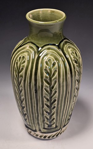 Green incised bottle