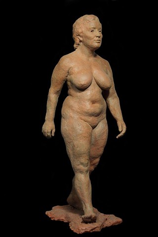 walking woman contemporary figure sculpture 