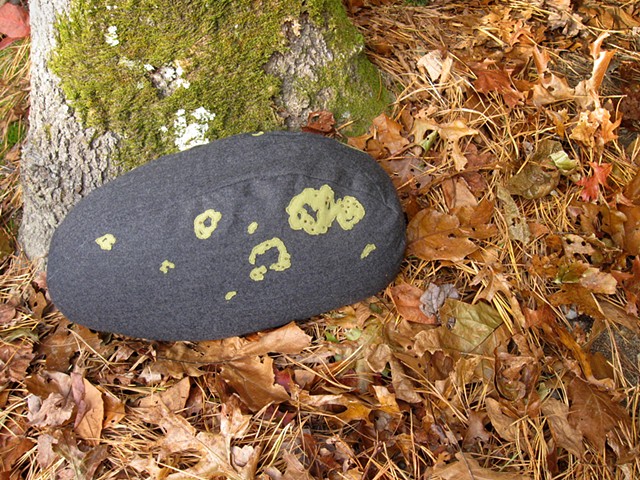stone shaped wool pillow with hand applique and embroidered lichen
