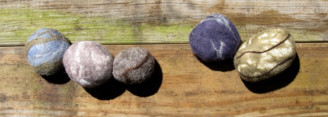 real stones covered in felted wool