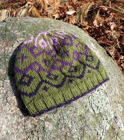 Handknit fair isle hat in purples and greens by chelsea clarke