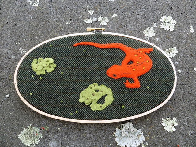Red eft and lichen forest floor amphibian fiber wall art by Chelsea Clarke