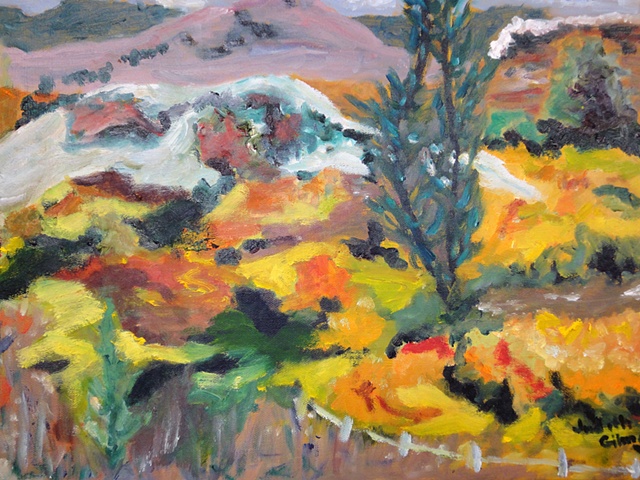 Copper and yellow colored grasses and bushes contrast with low flowing hills.in oil painting by Judith Gilman