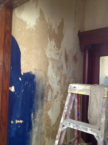 circa 1908 entry foyer during removal of painted wallpaper-over wallpaper prior to plaster repair and final finishes.