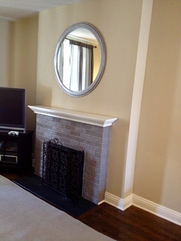 Brick fireplace and mantle after