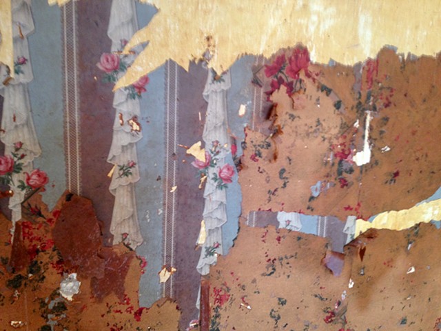 circa 1920 Craftsman master bedroom with painted stucco removed prior to removal of multiple original wallpaper layers